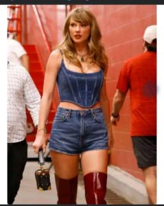 Breaking:FANS REVIEW: VERY ANNOYING; Why Will She Dress this way?- Taylor Swift on Thigh-High Red Boots and Short-Shorts